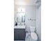 Clean bathroom with gray vanity, marble countertop, and shower/tub at 605 Rose Creek Cir, Duluth, GA 30097