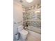 Updated bathroom with a glass shower and modern tile at 605 Rose Creek Cir, Duluth, GA 30097