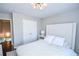 Spacious bedroom with double doors leading to a large closet at 605 Rose Creek Cir, Duluth, GA 30097