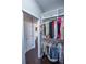 Well-organized closet with custom shelving and rods at 605 Rose Creek Cir, Duluth, GA 30097