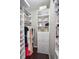 Custom closet with drawers and shelving for storage at 605 Rose Creek Cir, Duluth, GA 30097