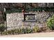 Stone entrance sign for Sugar Mill community at 605 Rose Creek Cir, Duluth, GA 30097