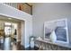 Two-story entryway with hardwood floors, open floor plan and balcony overlook at 605 Rose Creek Cir, Duluth, GA 30097
