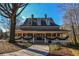 Two story home with wrap around porch at 605 Rose Creek Cir, Duluth, GA 30097