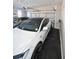 Garage with Tesla charging station at 605 Rose Creek Cir, Duluth, GA 30097