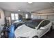 Two-car garage with Tesla charger and motorcycle at 605 Rose Creek Cir, Duluth, GA 30097
