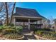 Covered pavilion with stone pathway and landscaping at 605 Rose Creek Cir, Duluth, GA 30097