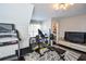 Home gym with weight bench, treadmill, and ample storage at 605 Rose Creek Cir, Duluth, GA 30097