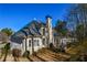 House exterior with deck and backyard view at 605 Rose Creek Cir, Duluth, GA 30097