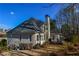 Back of house, showcasing a deck and backyard at 605 Rose Creek Cir, Duluth, GA 30097