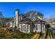 House exterior with deck and landscaping at 605 Rose Creek Cir, Duluth, GA 30097