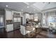 Modern kitchen with stainless steel appliances and white cabinetry at 605 Rose Creek Cir, Duluth, GA 30097