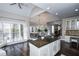 Open concept kitchen with island and breakfast nook at 605 Rose Creek Cir, Duluth, GA 30097