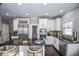 Modern kitchen featuring stainless steel appliances and white cabinetry at 605 Rose Creek Cir, Duluth, GA 30097