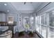 Cozy kitchen nook with two armchairs and a small table, near the kitchen at 605 Rose Creek Cir, Duluth, GA 30097