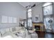 Open living room with vaulted ceilings, fireplace, and plenty of natural light at 605 Rose Creek Cir, Duluth, GA 30097