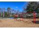 Red swings and playground area at 605 Rose Creek Cir, Duluth, GA 30097