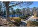 Tennis court with surrounding landscape at 605 Rose Creek Cir, Duluth, GA 30097