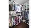 Large walk-in closet with ample shelving and hanging space at 605 Rose Creek Cir, Duluth, GA 30097