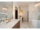 Elegant bathroom with marble finishes, freestanding tub, and dual vanities at 1409 Sheridan Ne Rd, Atlanta, GA 30324