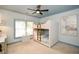 bedroom with built-in bunk beds, window seating, and art at 1409 Sheridan Ne Rd, Atlanta, GA 30324