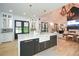 Eat-in kitchen with marble countertops, farmhouse sink, and French doors at 1409 Sheridan Ne Rd, Atlanta, GA 30324