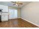 Kitchen with white shaker cabinets and stainless steel appliances at 242 Chads Ford Way, Roswell, GA 30076