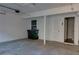 Attached garage with extra storage space and interior access at 242 Chads Ford Way, Roswell, GA 30076