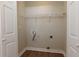 Laundry closet with shelving and hookups for washer/dryer at 242 Chads Ford Way, Roswell, GA 30076