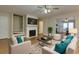 Living room featuring hardwood floors, fireplace, and open floorplan at 242 Chads Ford Way, Roswell, GA 30076