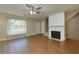 Living area with hardwood floors, fireplace and lots of light at 242 Chads Ford Way, Roswell, GA 30076