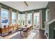 Bright dining room with mid-century modern furniture at 308 Gibson Se St, Atlanta, GA 30316