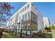 Modern three-story townhome with a sleek design and fenced yard at 308 Gibson Se St, Atlanta, GA 30316