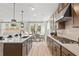 Modern kitchen with stainless steel appliances and an island at 51 Bennett Farm Dr, Loganville, GA 30052