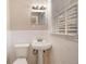 Clean bathroom featuring pedestal sink and tiled walls at 2315 Barge Sw Rd, Atlanta, GA 30331