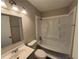 Clean bathroom featuring a tub shower combo and updated vanity at 4515 Wonder Valley Trl, Decatur, GA 30034