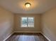 Bright bedroom with large windows and neutral decor at 4515 Wonder Valley Trl, Decatur, GA 30034