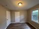 Bright bedroom with new flooring and neutral walls at 4515 Wonder Valley Trl, Decatur, GA 30034