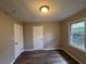 Well-lit bedroom with ample closet space and neutral walls at 4515 Wonder Valley Trl, Decatur, GA 30034