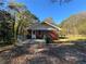 Brick ranch house with a deck and a fenced-in backyard at 4515 Wonder Valley Trl, Decatur, GA 30034