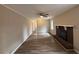 Bright living room with hardwood floors and a brick fireplace at 4515 Wonder Valley Trl, Decatur, GA 30034
