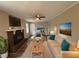 Spacious living room with a brick fireplace and lots of natural light at 4515 Wonder Valley Trl, Decatur, GA 30034