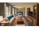 Spacious living room featuring hardwood floors, comfortable furniture, and built-in shelving at 4515 Wonder Valley Trl, Decatur, GA 30034