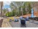 Relaxing backyard with firepit and hanging chair at 1240 Roswell Manor Cir, Roswell, GA 30076