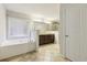 Bathroom with double vanity, soaking tub and separate shower at 1240 Roswell Manor Cir, Roswell, GA 30076