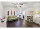 Multipurpose room with a sofa and built-in shelving at 1240 Roswell Manor Cir, Roswell, GA 30076