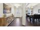 Elegant dining room with hardwood floors and a modern chandelier at 1240 Roswell Manor Cir, Roswell, GA 30076