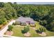 Aerial view of a luxurious home with large backyard at 1420 Arblay Pl, Loganville, GA 30052