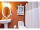 Simple bathroom with pedestal sink and shower at 1420 Arblay Pl, Loganville, GA 30052