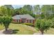 Ranch style home with a large backyard and mature trees at 1420 Arblay Pl, Loganville, GA 30052